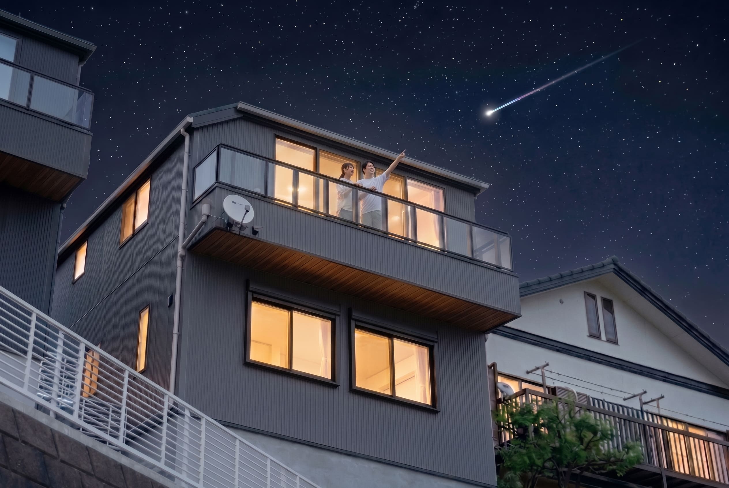 高台の家から流れ星を眺める夜